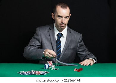 Blackjack In A Casino, Casino Worker Shuffling Cards