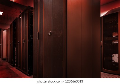 Blackout concept. Emergency failure red light in data center with servers. big data storage and cloud computing