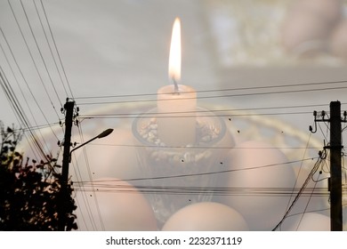 Blackout – power grid overloaded. Blackout concept. Earth hour. Burning flame candle and power lines on background. Energy crisis. Candle flame. - Shutterstock ID 2232371119