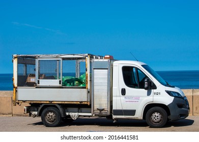 Blackpool, Lancashire  UK - July 18th 2021: Blackpool Council Rubbish Collection Truck Early Morning Beneath Blue Summer Skies