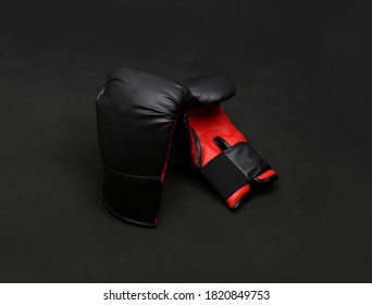 Black-red Boxing Gloves On Dark Background