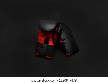 Black-red Boxing Gloves On Dark Background