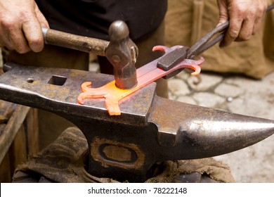 blacksmith forged iron smith anvil hammerman traditional hammer beating - Powered by Shutterstock