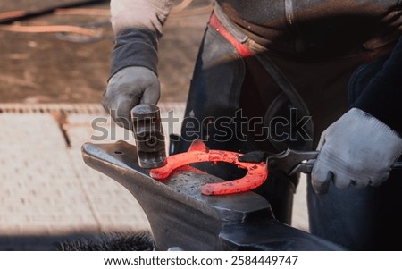 Similar – Image, Stock Photo Skilled blacksmith forging metal in traditional workshop