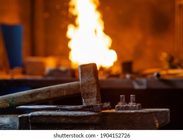 Blacksmith Hammer Stands On Anvil Against Stock Photo (Edit Now) 1904152726