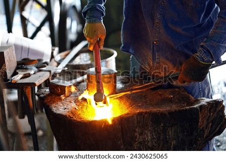 Similar – Image, Stock Photo Artisan blacksmith forging metal by fiery forge