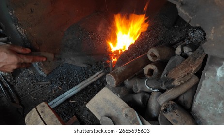 Blacksmith's Forge with Fire and Tools, showing a Traditional Ironworks