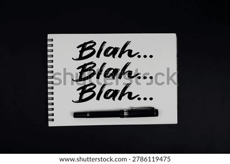 Blah Blah Blah text written on notepad