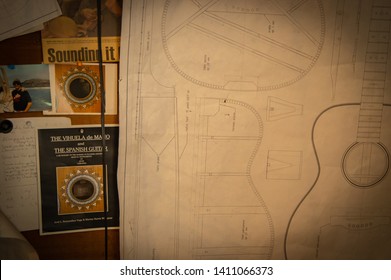 Blaine, WA / USA - May 29, 2009: Illustrative Editorial Shot Of A Classical Guitar Blueprint Plan On The Wall Of A Luthier's Shop With Other Memorabilia On The Wall