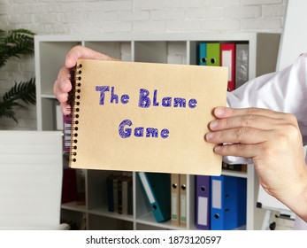 The Blame Game Sign On The Page.
