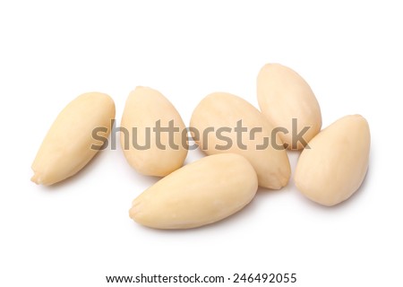 Blanched almonds on white background