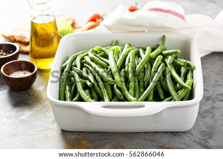 Blanched green beans in a baking dish, healthy side dish