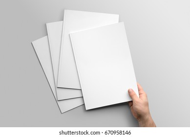 Blank A4 photorealistic brochure mockup on light grey background.  - Shutterstock ID 670958146