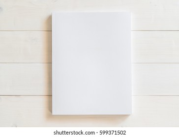 Blank A4 Size Book Cover Mockup Template With Page Front Side On White Surface On Wood Table