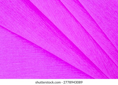blank abstract backdrop: close up of folded purple color wrapping paper tetxture