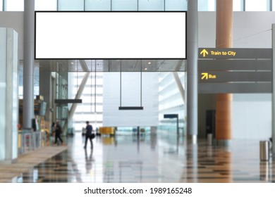 Blank advertising banner, billboard mockup in generic modern interior or airport environment. Large digital display screen, an out-of-home OOH media display space