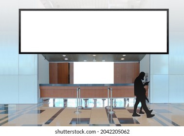 Blank Advertising Banner And Booth Mockup In Modern Airport Retail Environment; Large Digital Display Screen. Billboard Poster, Out-of-home OOH Media Display Space.