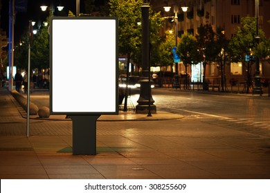 Blank Advertising Billboard In The City At Night.