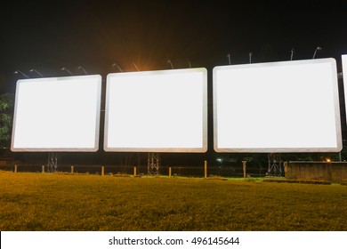 Blank Advertising Billboard In The City At Night.