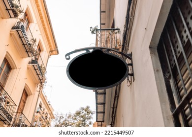 Blank Advertising Board On City Building Outdoors. Blank Sign Outside A Shop Or Restaurant With Copy Space