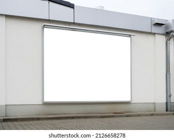 Blank Advertising Board On A Wall Of A Super Market Building. Empty Place For Marketing Ads. Mockup Of A Banner Frame Outdoors On A Facade. Perfect For Testing Commercials.