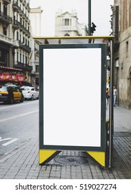 Blank Advertising Light Box On The Bus Stop, Mockup Of Empty Ad Billboard On Bus Station, Template Banner On Background City Street For Message Or Text In Barcelona, Afisha Board