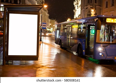 Blank Advertising Light Box On Bus Stop, Mockup Of Empty Ad Billboard On Night Bus Station, Template Banner On Background City Street For Text, Afisha Board And Headlights Standing Bus.