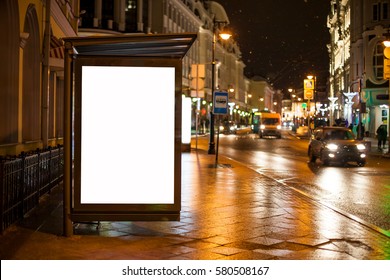 Blank Advertising Light Box On Bus Stop, Mockup Of Empty Ad Billboard On Night Bus Station, Template Banner On Background City Street For Text, Afisha Board And Headlights Of Cars.