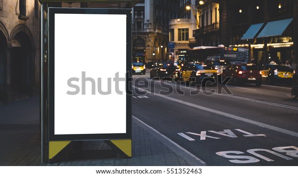 Blank advertising light box on bus stop, mockup of\
empty ad billboard on night bus station, template banner on\
background city street for poster or sign, afisha board and\
headlights of taxi cars\
