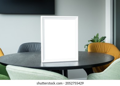 Blank award template mockup in modern office room. Empty picture frame. Insert your text or design for certificate or diploma.