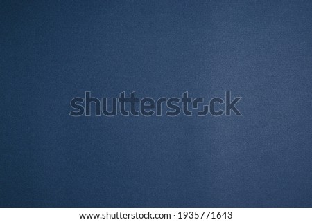 Blank background texture of blue velvety paper. Design layout. Copy space