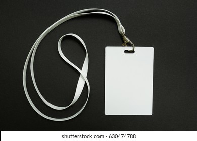 Blank Badge Mockup Isolated On Black. Plain Empty Name Tag Mock Up Hanging On Neck With String, On White Background.