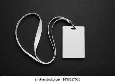 Blank badge mockup. Plain empty name tag mock up hanging on neck with string. - Shutterstock ID 1438627028