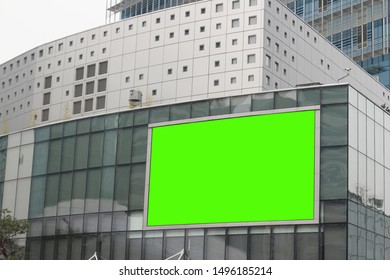 blank big billboard with green screen on the building. - Powered by Shutterstock