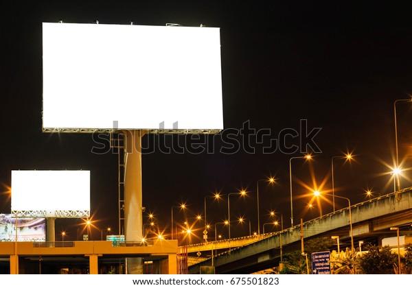 Blank big billboard
night background for your advertising,put your own text
here,isolate white on
board