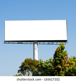 Blank Billboard Against Blue Sky.