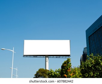 Blank Billboard Against Blue Sky.