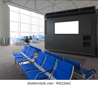 Blank Billboard And Blue Chair Waiting Room At A International Airport With Busy Traveler