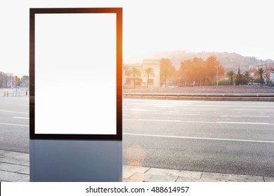 Blank Billboard With Copy Space For Your Text Message Or Content, Public Information Board On Background Of Old City, Advertising Mock Up Empty Banner In Metropolitan At Beautiful Sunny Day