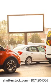 Blank Billboard At A Frequent Highway In Downtown Of Istanbul. Visual Media Banner Captured At Sunset And Rush Hours With Many Cars Waiting To Move.