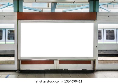 Blank Billboard LCD Advertisement For Adjust Your Message In Electric Train Station, Mockup Selective Focus With Clipping Path.