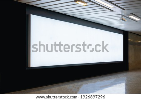 Blank billboard mock up signboard frame advertising located in subway underground hall, blurred background layout insert text for customer