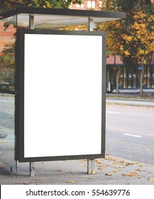 Blank Billboard On City Bus Station