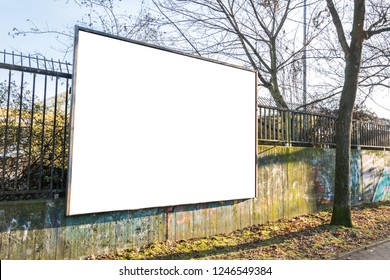 Blank Billboard On A Fence In Urban Environment In Winter