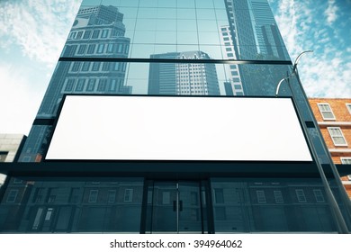Blank billboard on glassy wall of business center, mock up, 3D Render