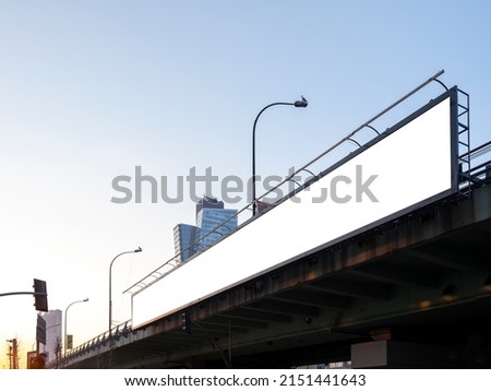 blank billboard on overpass, front view