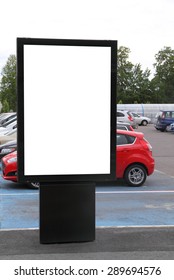 Blank Billboard On A Parking Lot
