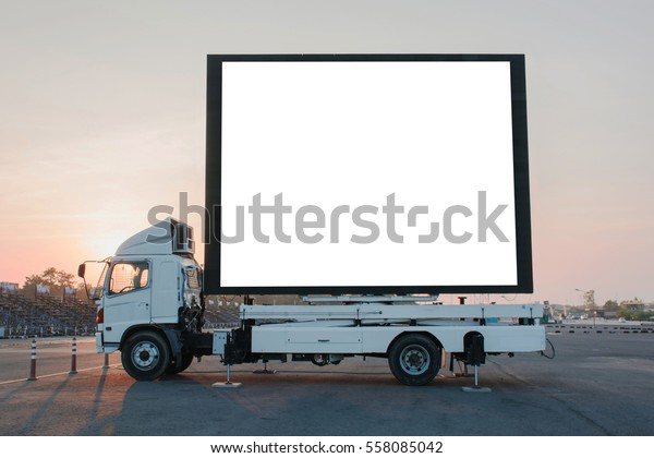 Blank billboard\
on a truck LED panel for sign Advertising at twilight sky sunset\
background, for an\
advertisement