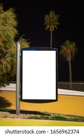 Blank Billboard Outdoors, Outdoor Advertising, Public Information Place Holder Board Advertising Stand At The Seaside Promenade At Night