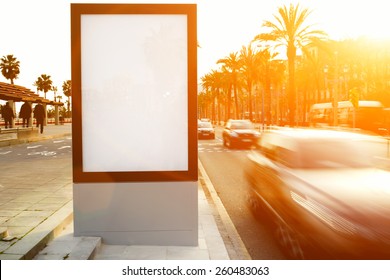 Blank Billboard Outdoors, Outdoor Advertising Mock Up, Public Information Board On City Road, Flare Sun Light